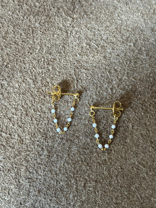 White /gold beaded earrings