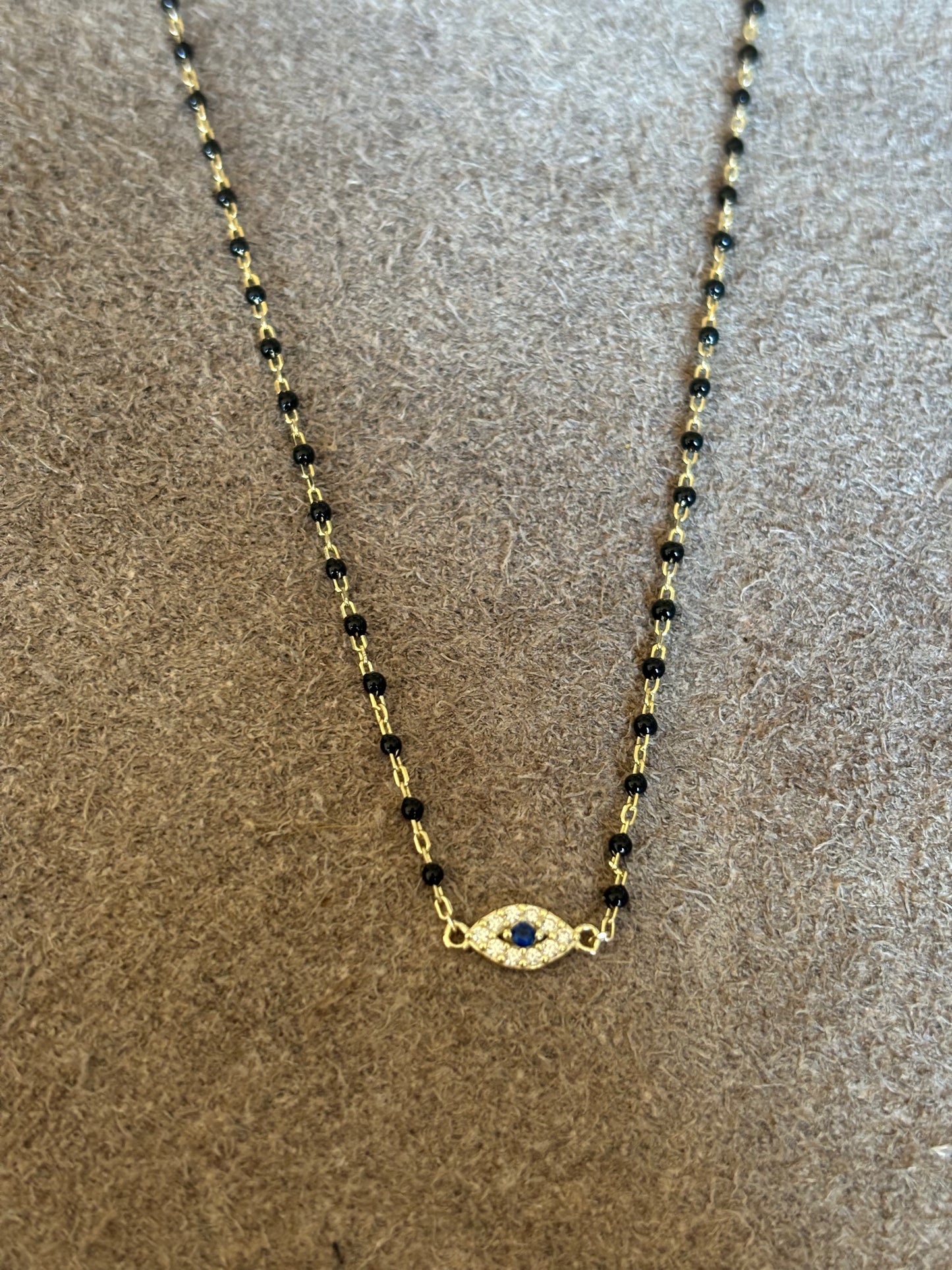 Evil eye black/gold beaded chain necklace