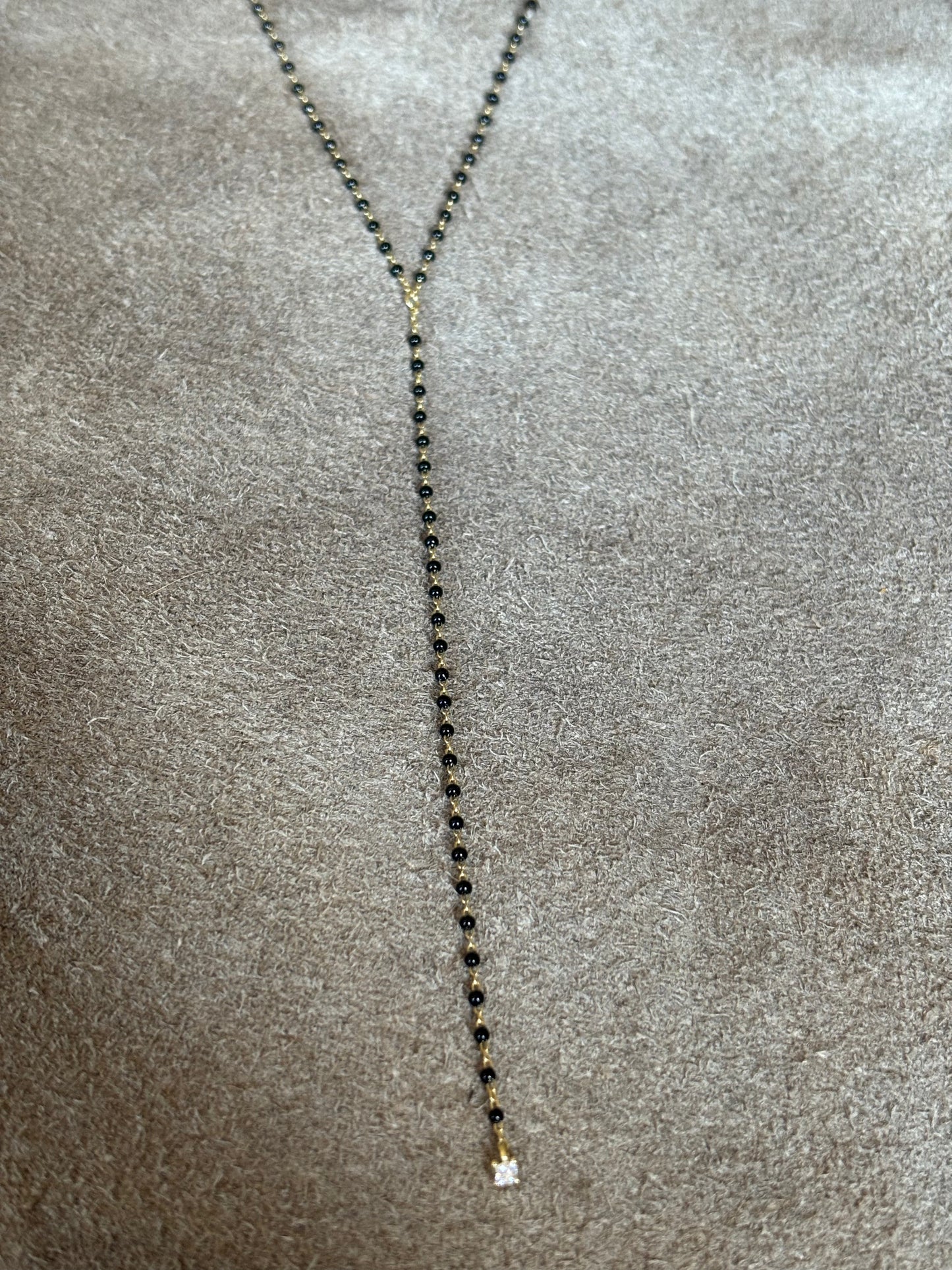 Black/gold beaded lariat