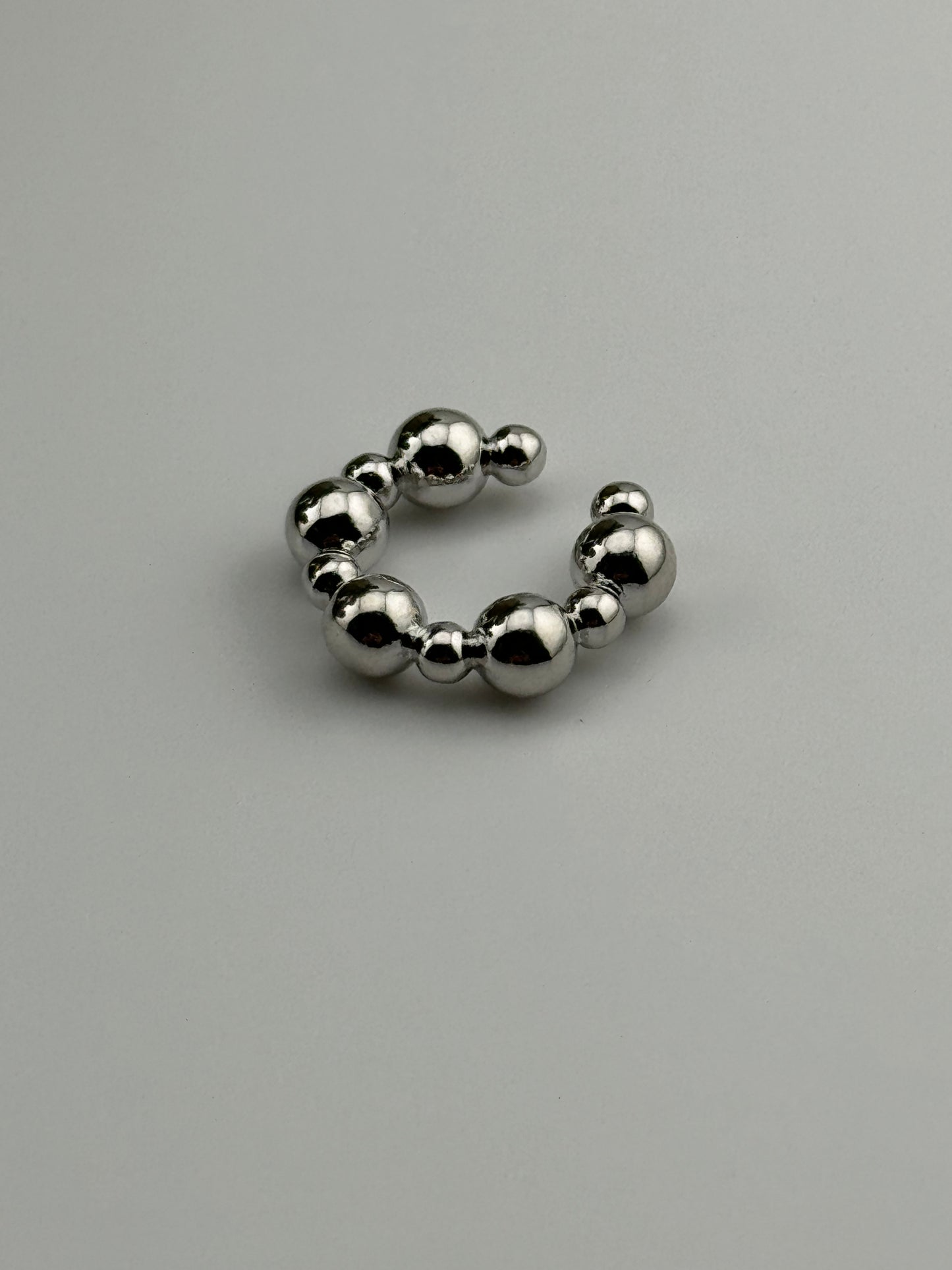 Ball silver ear cuff